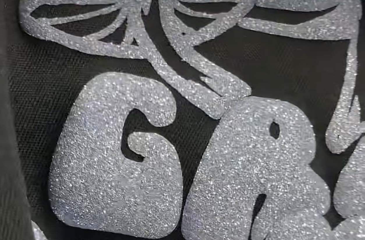 Custom color matched brand logo on a sports jersey
