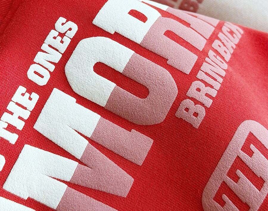 Two-color brand logo on a heavyweight tee